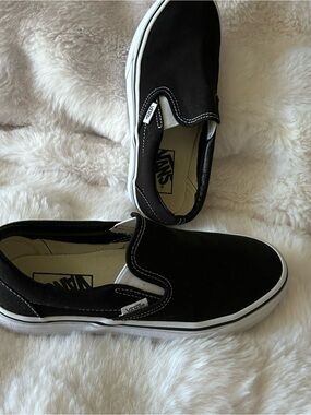 Vans Black and White Classic Slip-On Sneakers